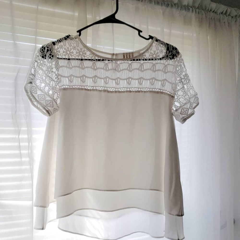 White flowy blouse
